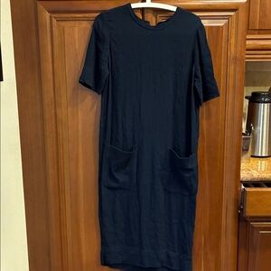 Raquel Allegra navy blue short sleeve dress front pockets
